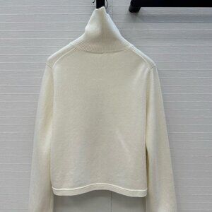 Alaia new triangle-cut wool knit cover-up, s